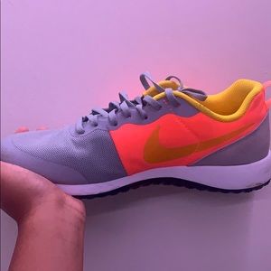White yellow grey orange Nike’s